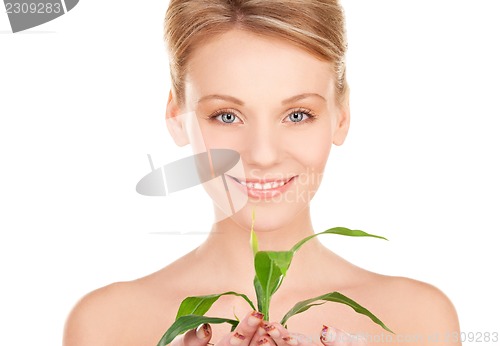 Image of woman with sprout