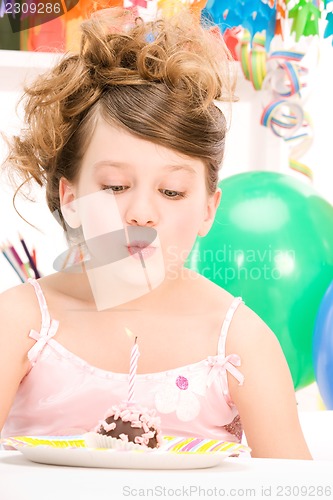 Image of party girl with cake