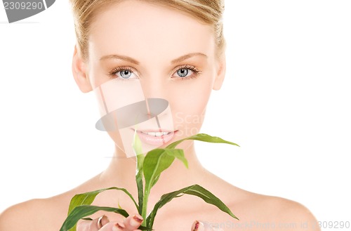 Image of woman with sprout