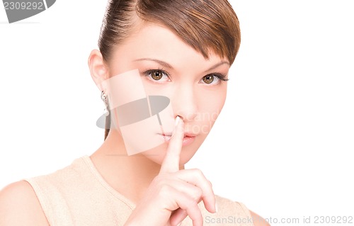 Image of finger on lips