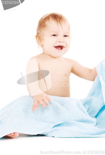 Image of baby with blue towel