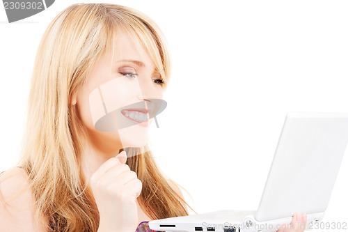 Image of teenage girl with laptop computer