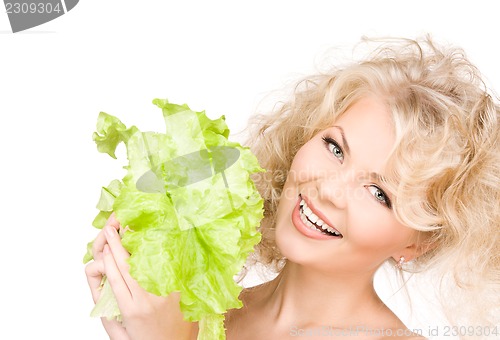 Image of happy woman with lettuce