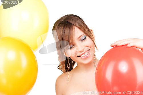 Image of happy teenage girl with balloons