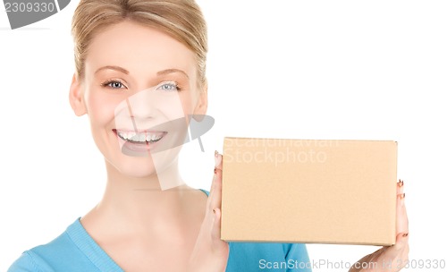 Image of businesswoman with parcel