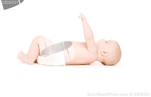 Image of laying baby boy in diaper