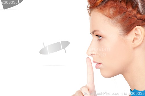 Image of finger on lips