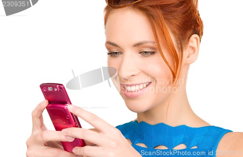 Image of happy woman with cell phone