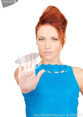 Image of woman making stop gesture