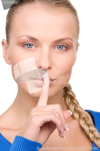 Image of finger on lips