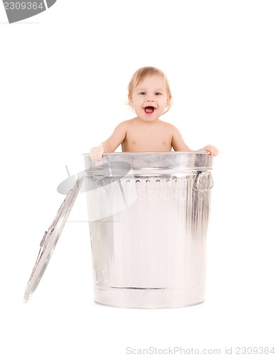 Image of baby in trash can