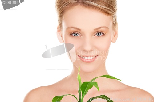 Image of woman with sprout