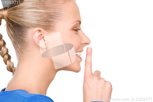 Image of finger on lips