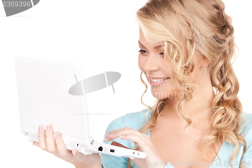 Image of happy woman with laptop computer