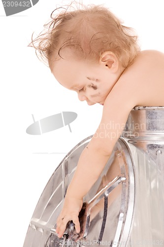 Image of baby in trash can
