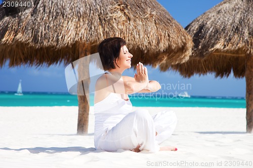 Image of meditation on the beach