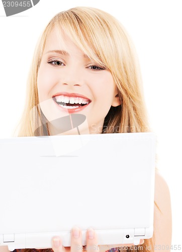 Image of teenage girl with laptop computer