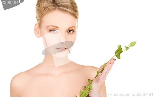 Image of woman with sprout