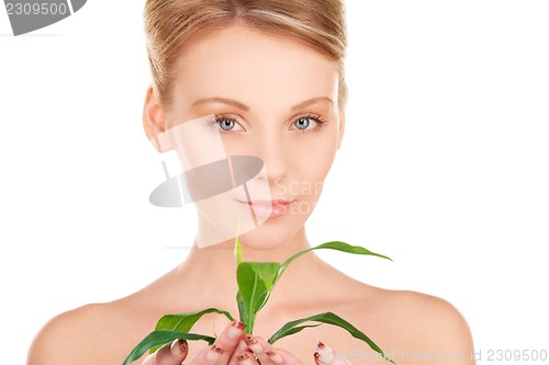 Image of woman with sprout