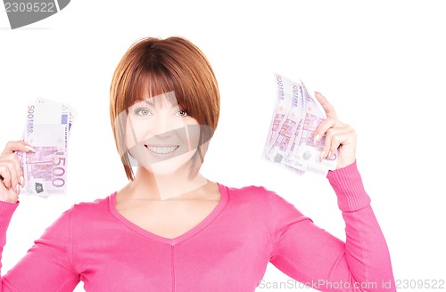 Image of happy woman with money