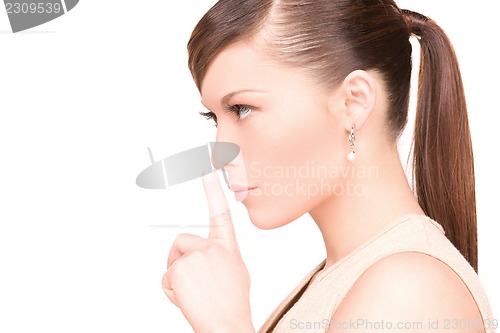 Image of finger on lips