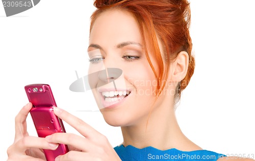 Image of happy woman with cell phone