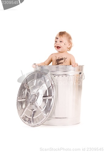 Image of baby in trash can