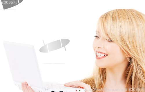 Image of teenage girl with laptop computer