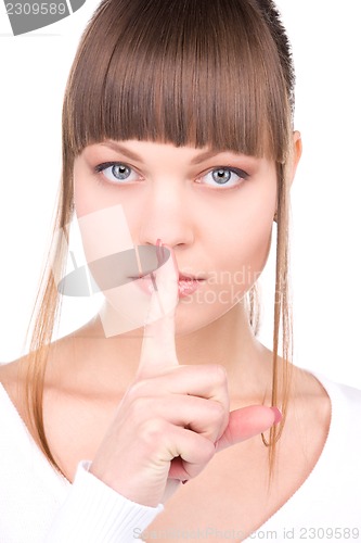 Image of finger on lips