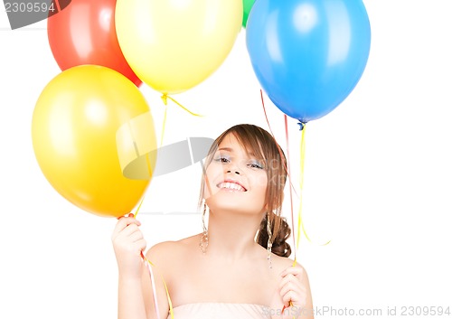Image of happy teenage girl with balloons