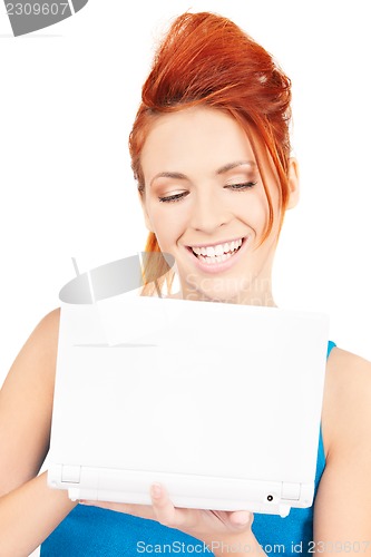 Image of happy woman with laptop computer