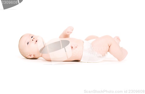 Image of laying baby boy in diaper