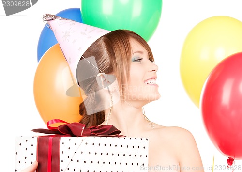 Image of party girl with balloons and gift box