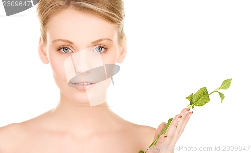 Image of woman with sprout