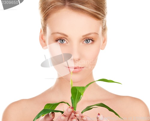 Image of woman with sprout
