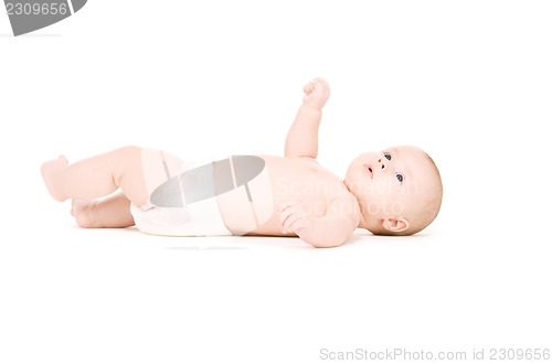 Image of laying baby boy in diaper