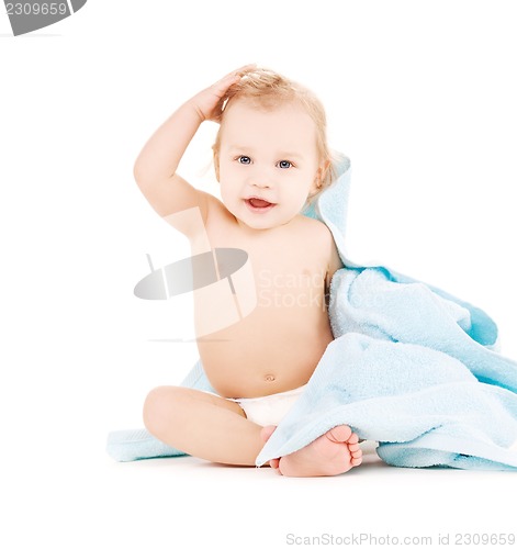 Image of baby with blue towel