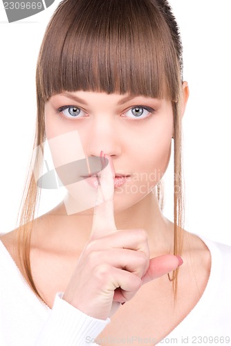 Image of finger on lips