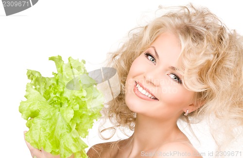 Image of happy woman with lettuce