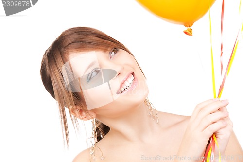 Image of happy teenage girl with balloons