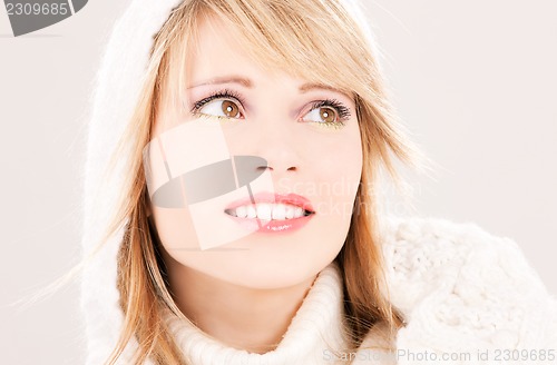 Image of lovely teenage girl in hoodie