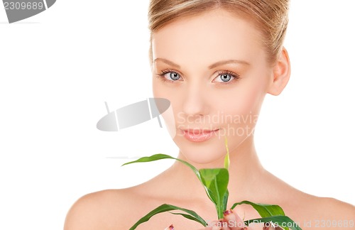 Image of woman with sprout