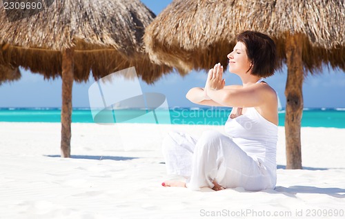 Image of meditation on the beach