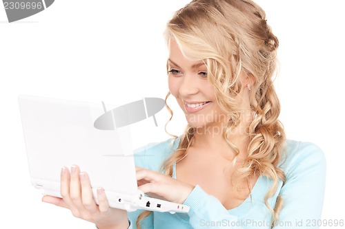 Image of happy woman with laptop computer