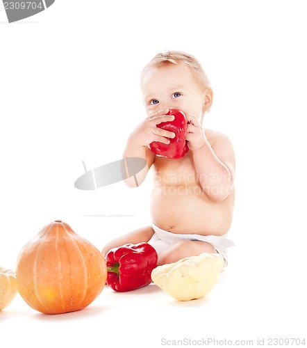 Image of baby boy with vegetables