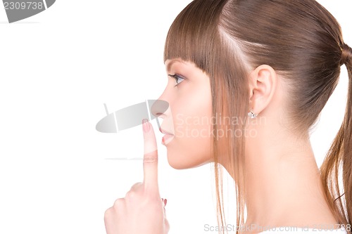 Image of finger on lips