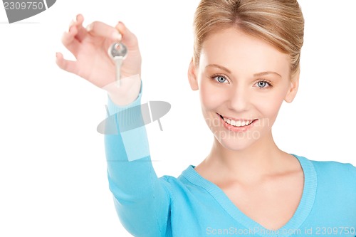 Image of happy woman with keys