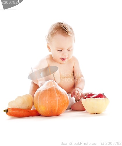 Image of baby boy with vegetables