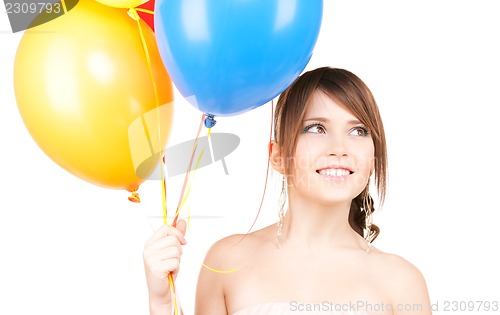 Image of happy teenage girl with balloons