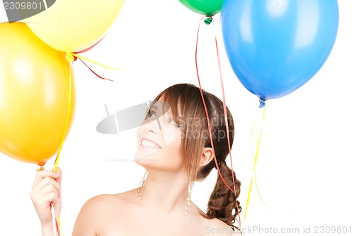 Image of happy teenage girl with balloons